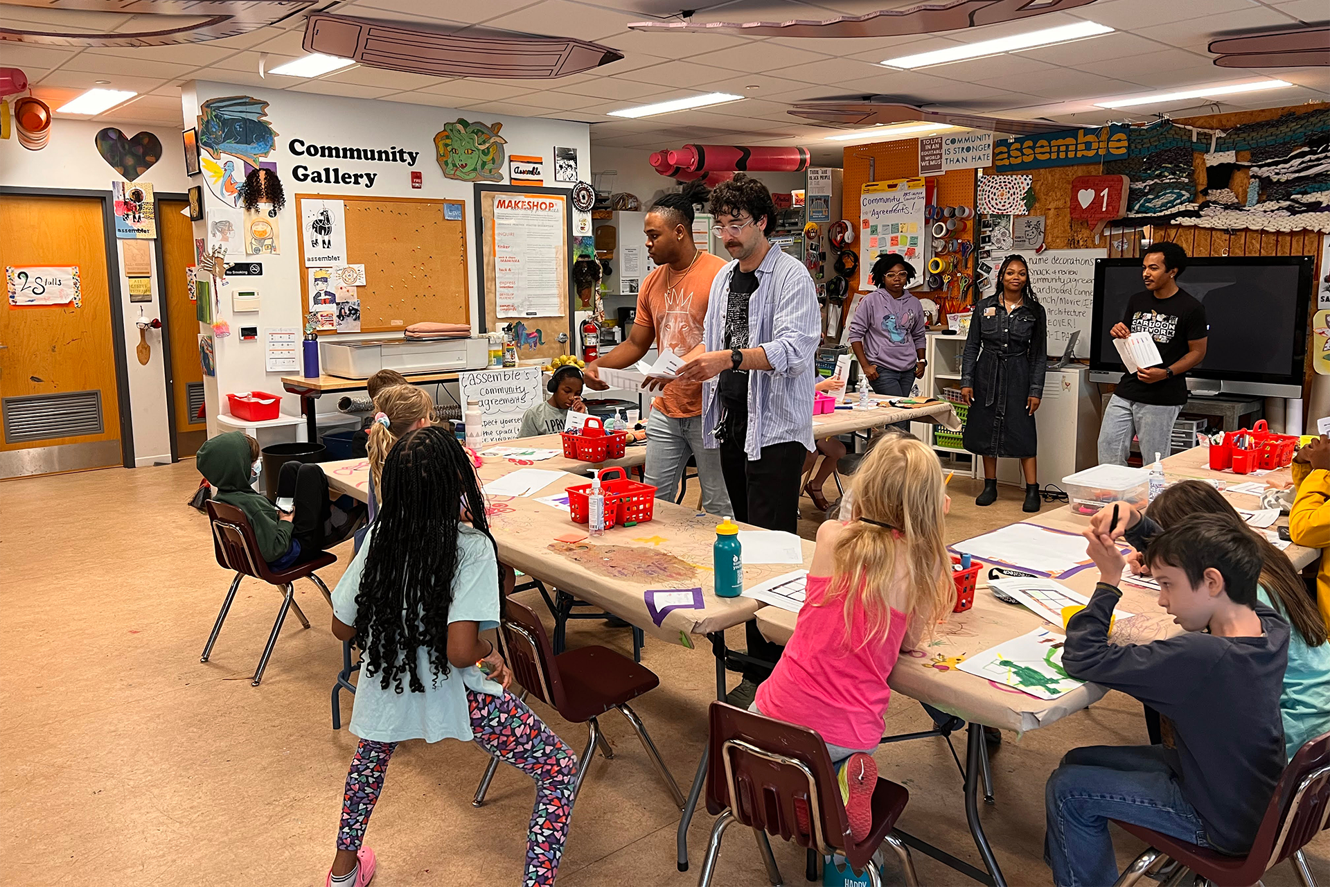 https://aap.cornell.edu/A%20classroom%20of%20elementary%20students%20are%20gathered%20around%20tables%2C%20being%20instructed%20by%20young%20adults