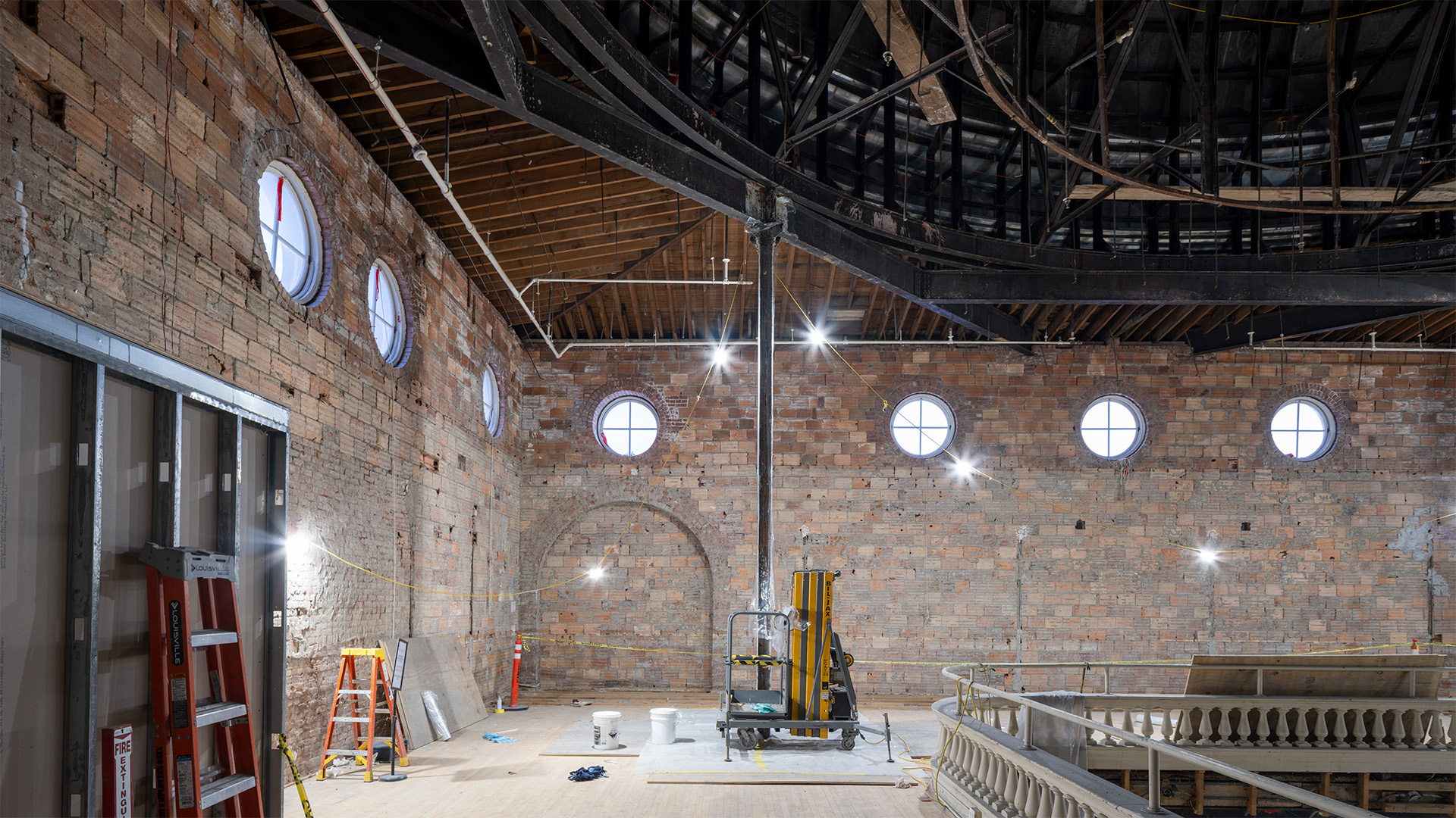 an interior view of a domed building under construction