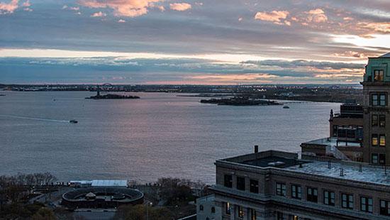 view of New York City harbor from a tall building