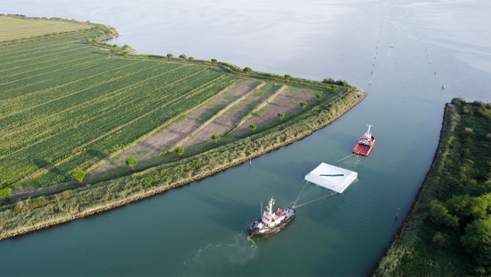 Pavilion floating down a river