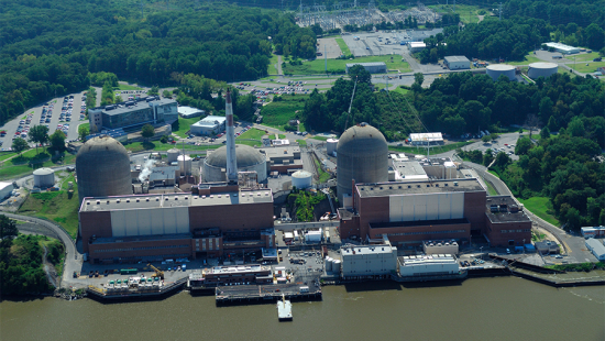 Aerial view of nuclear power plant beside a river