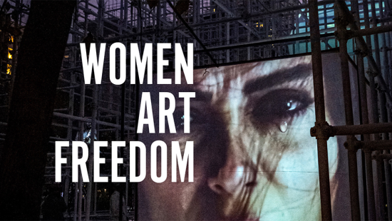 Book cover featuring video projection of a woman's face with a tear and the text Women Art Freedom