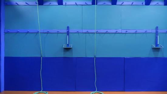 a blue art instillation with a copper floor