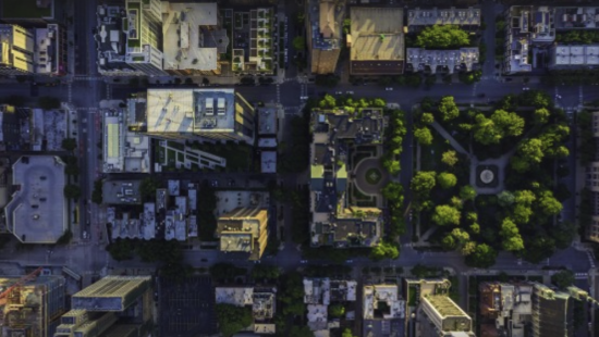 A birdseye view of a few city blocks.