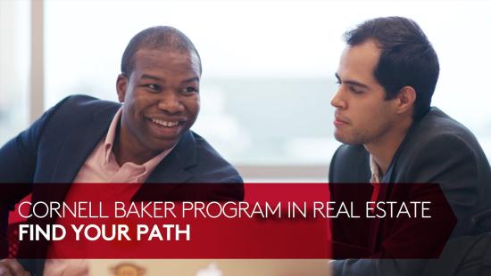 Two people sitting next to each other and talking.