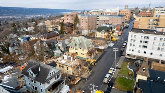 Houses in a city being deconstructed.