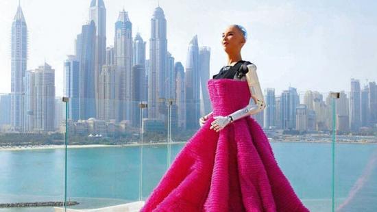human-robot figure in a red ball gown, a river, urban skyscrapers.
