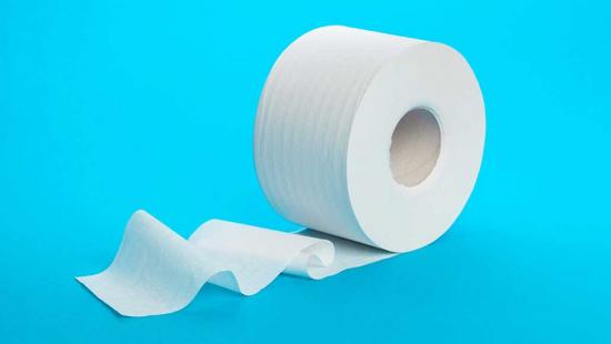 a white roll of paper on a blue background
