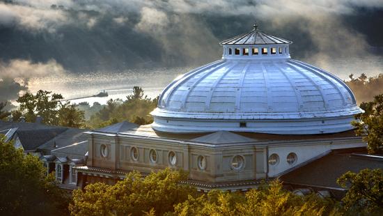 The Sibley Hall dome, with fog rolling in over Cayuga Lake. photo / Lindsay France (UREL)