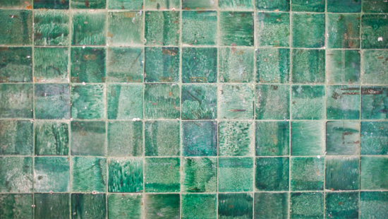 Green tiles in various shades.