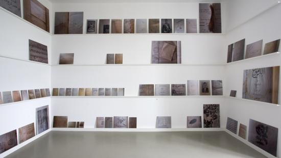 paintings in a gallery space.