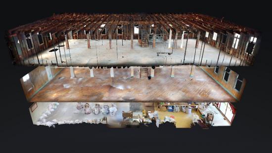 A building model on a black background.