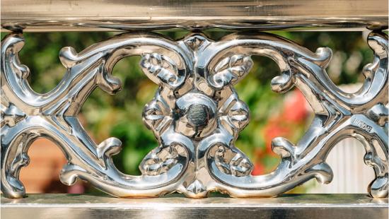 Close up of ornamental stainless steel fencing