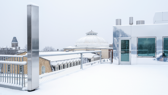 View across campus from a snow-covered rooftop.