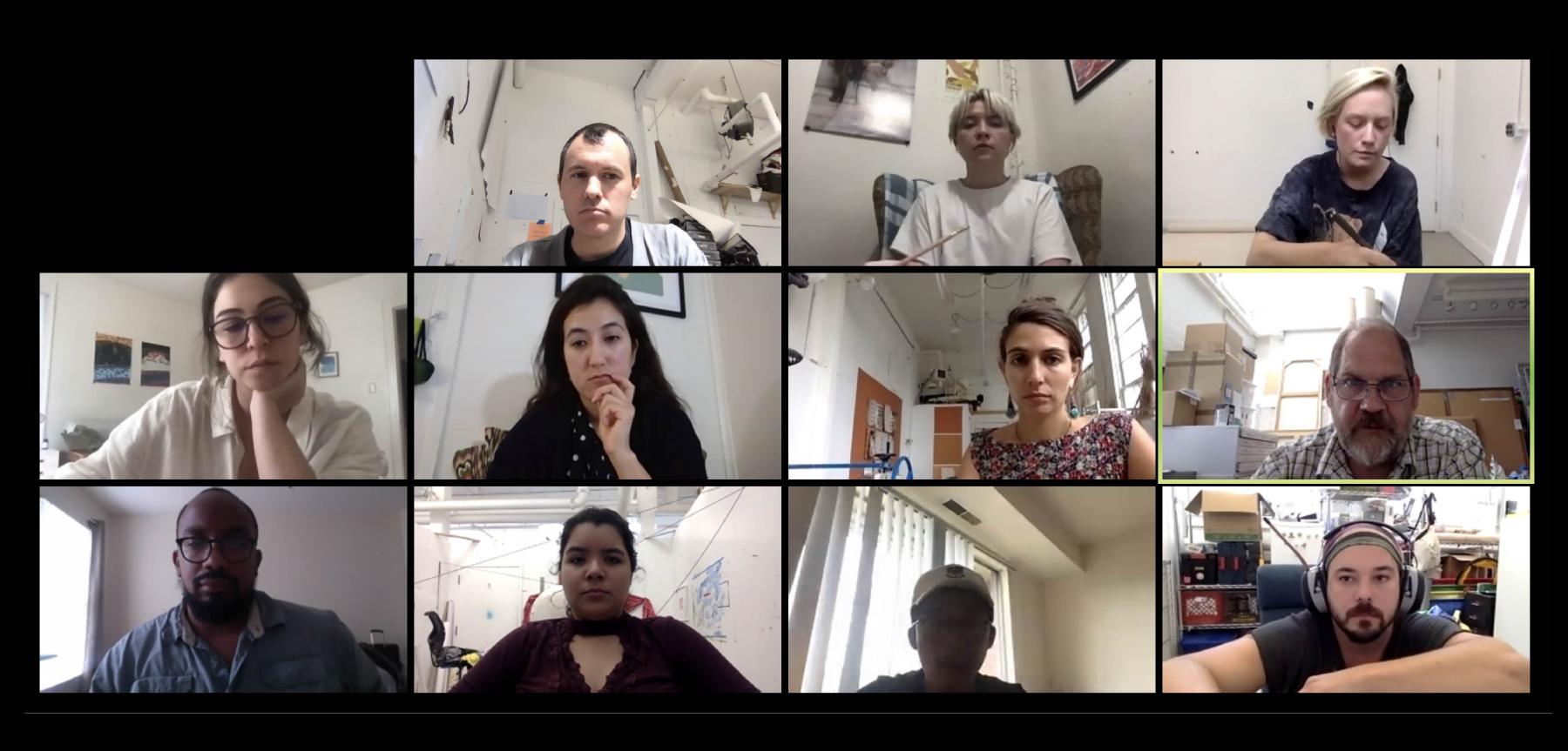 Screenshot from a computer of eleven people during a zoom call with a blank black space in the upper left corner. 