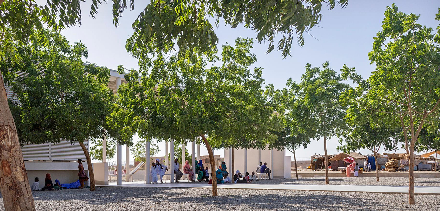 People gathered under trees