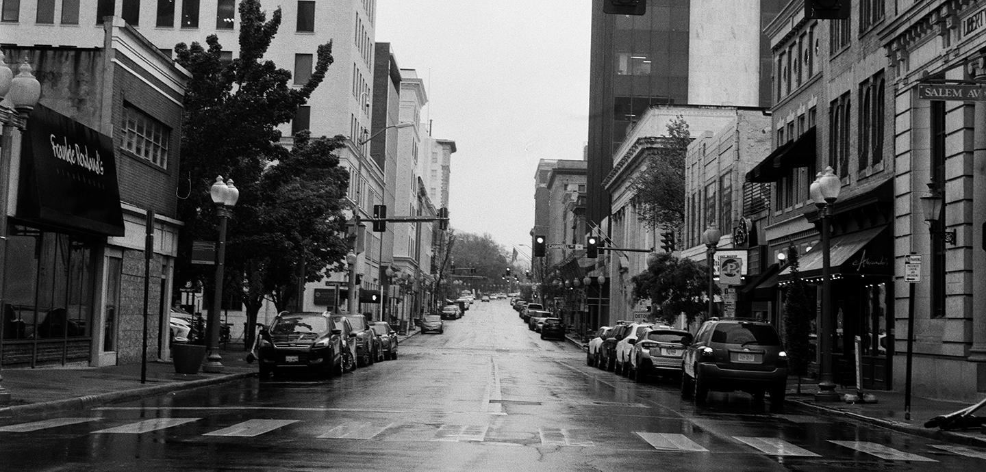 street view of Roanoke, VA, USA including cars, building and traffic lights 