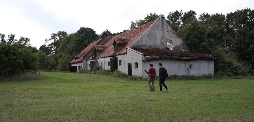 Architecture students outside the horse barn at Bzionkow