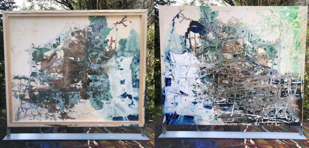 Two abstract paintings next to each other in the outdoors.