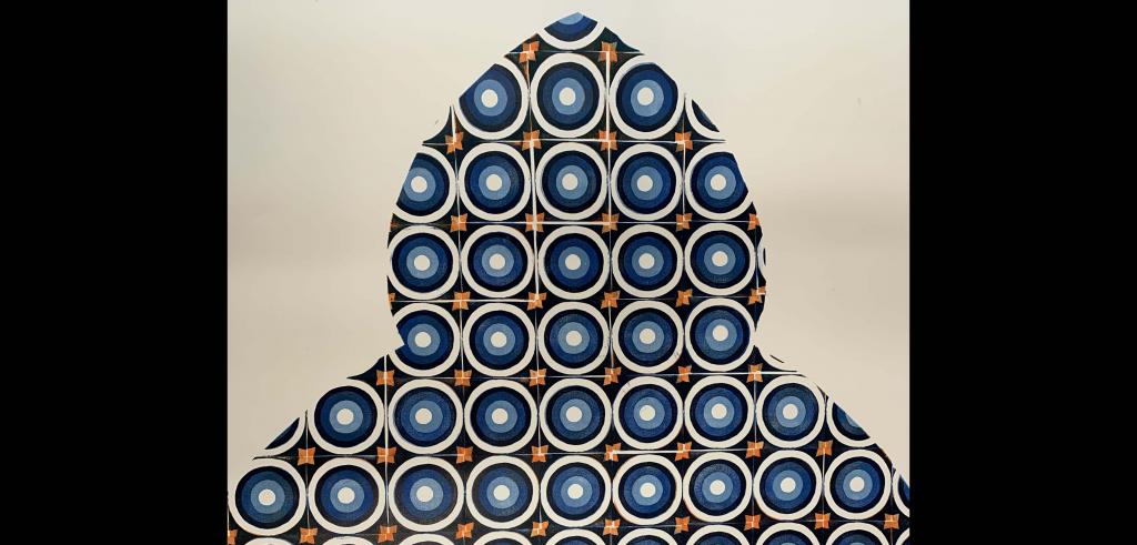 Print of identical circles arranged in a pattern of blues and white in a pointed dome shape.