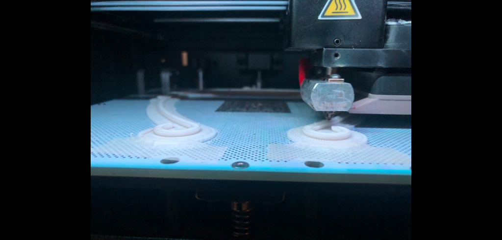 3D printer close up, printing for PPE