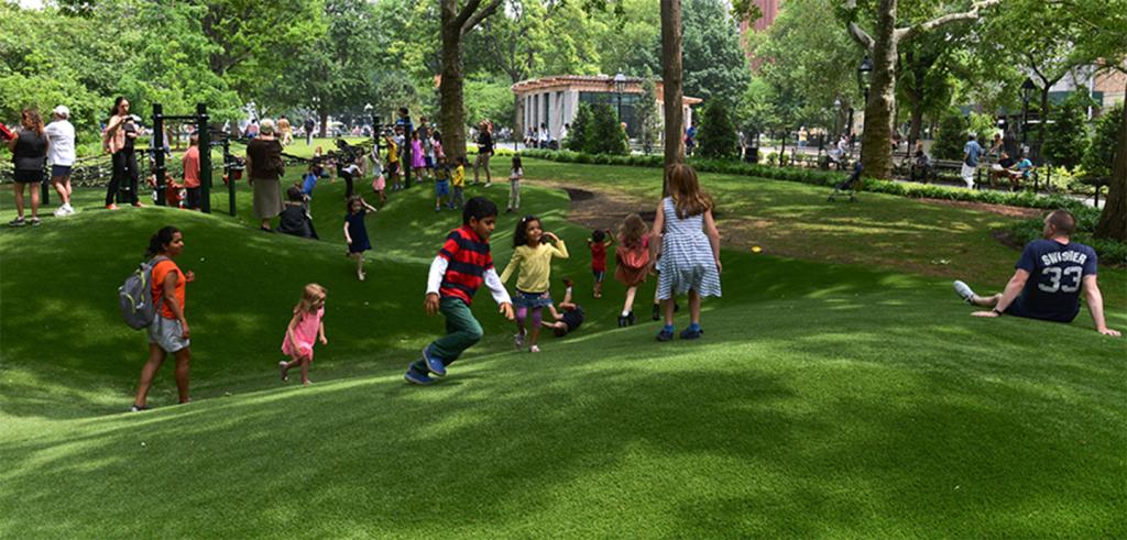 a group of children playing in a park