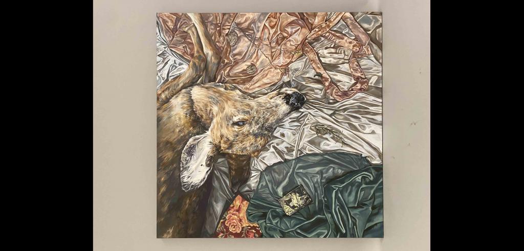Painting of a deer laying upside down on different types of wrinkled fabric.