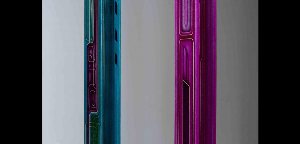 Gray background with a blue and pink stripes.