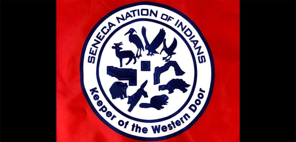 flag with the Seneca Nation of Indians logo and a red background