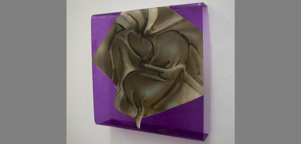 Painting of brown wrinkled fabric painted on semi-transparent purple Plexiglas with edges curved onto the white wall.