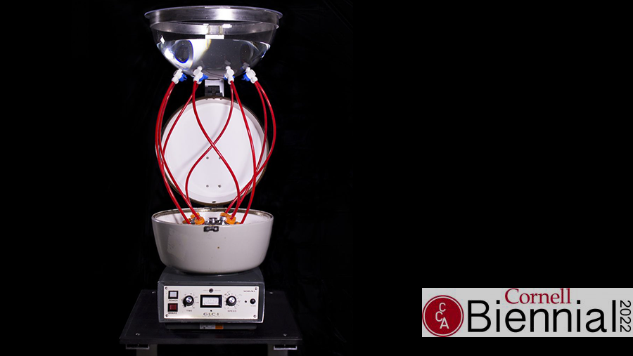 Bowls and wires stacked on top of a scientific machine