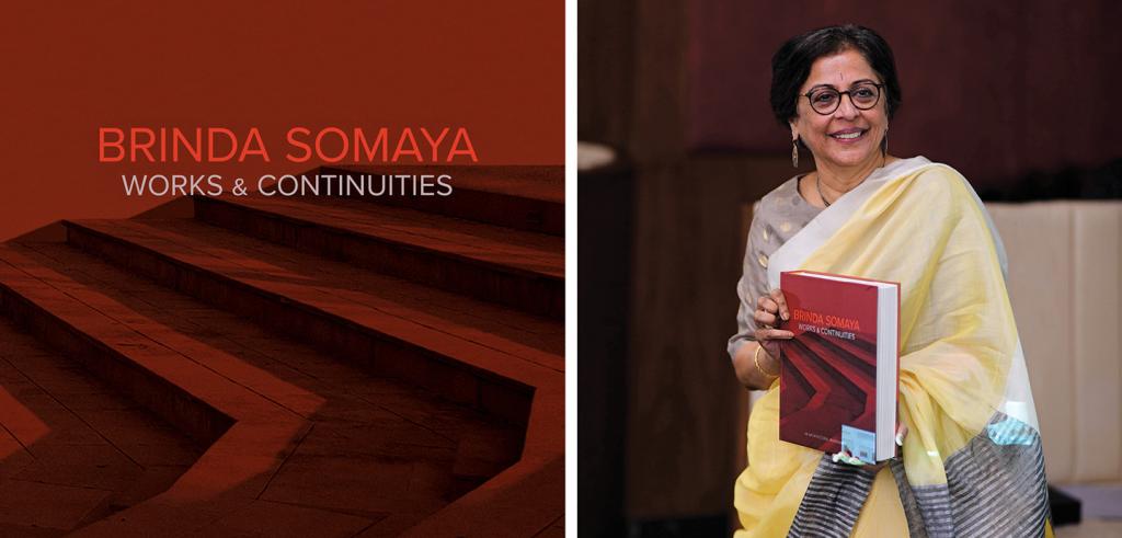 A red book cover which reads Brinda Somaya,Works & Continuities, alongside an image of Brinda who is holding the book and smiling. 