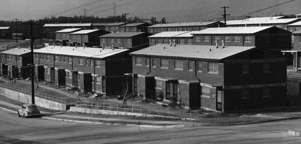 black and white photograph of large public housing units