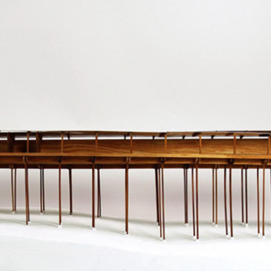 Horizontal wood model on stilts. 