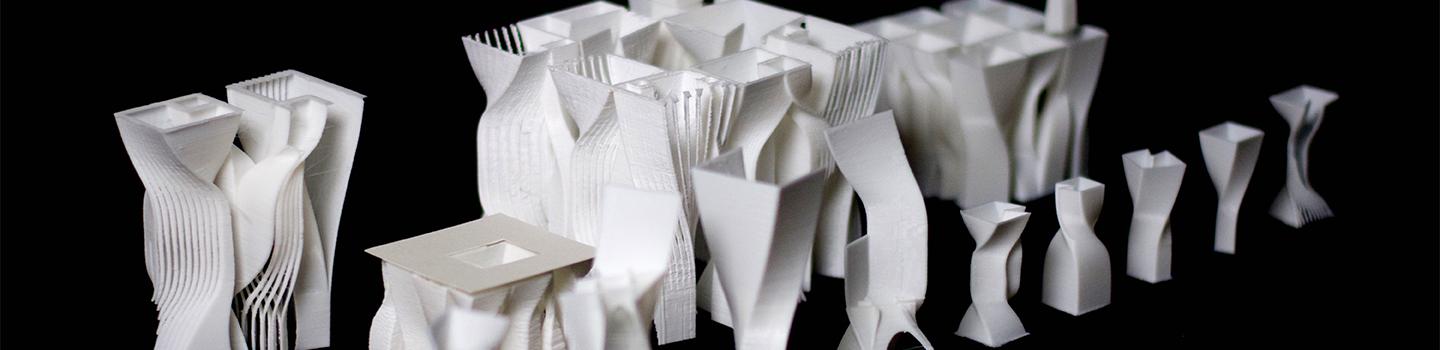 Study models of white, twisting structures.