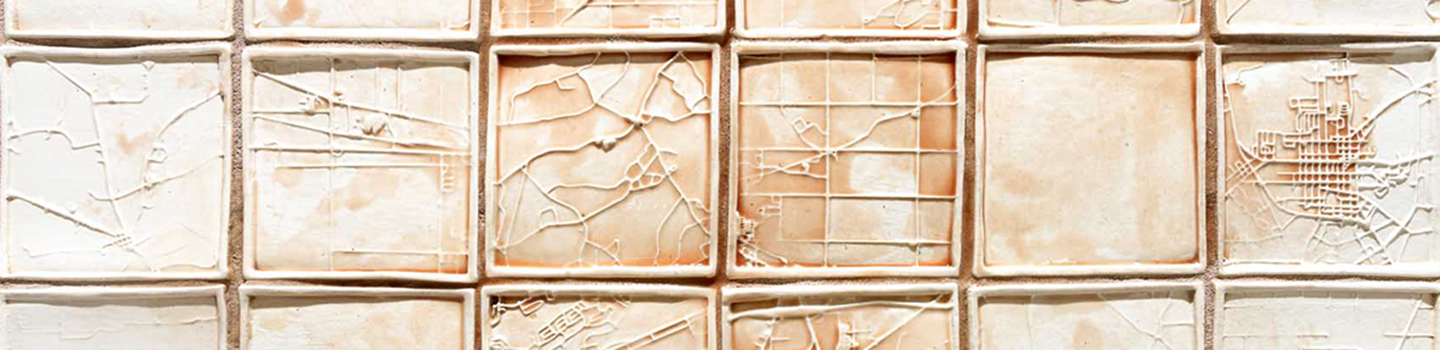 Ceramic tiles with various cracked patterns arranged next to one another.