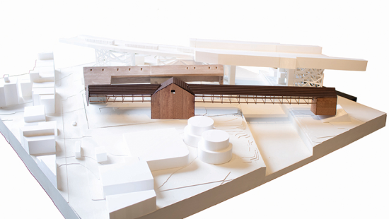 Site model of proposed wood brewery stands out in white context.