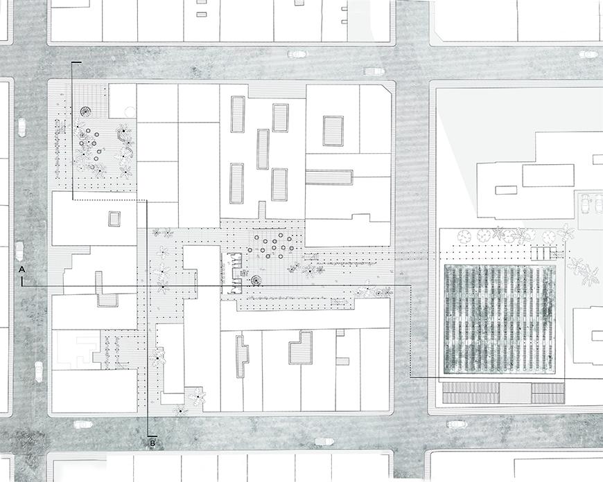 Plan drawing with streets toned darker showing a city block in which the project is proposed on the ground floor.