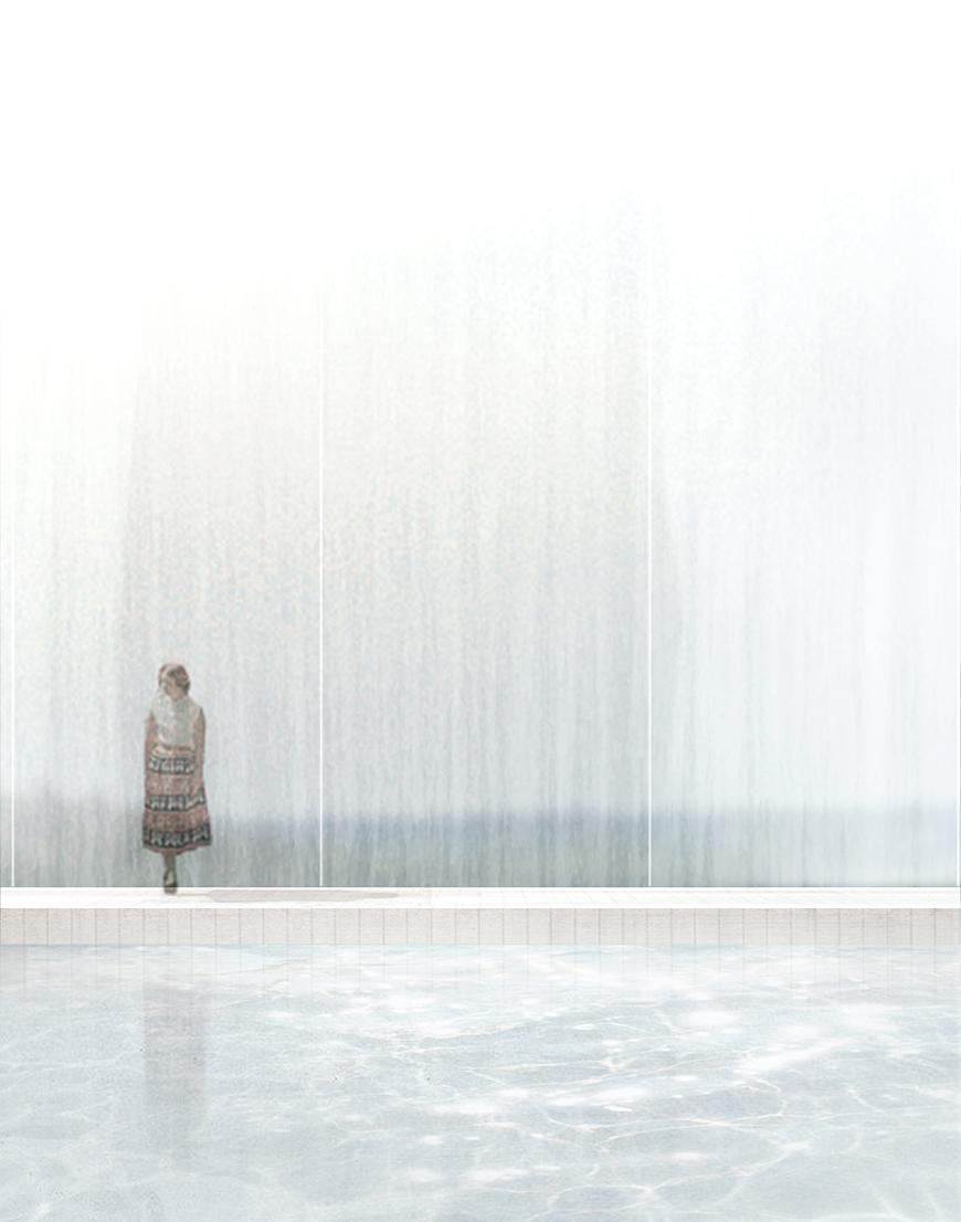 Render showing human figure standing on the side of a pool or water, with glass xurtain-wall behind them and landscape beyond. 