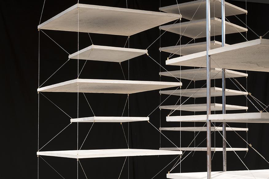 Digital rendering of an architectural model against a black background. 