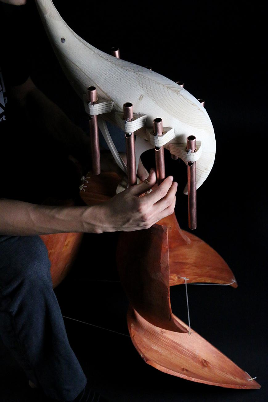 A handmade wooden instrument. 