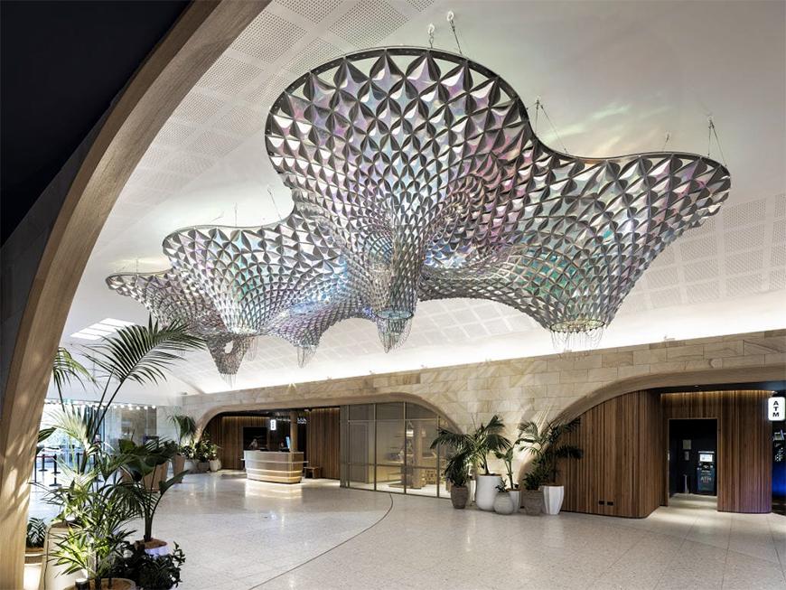 Lobby with sculpture hanging from ceiling