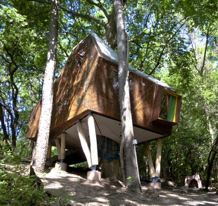 Geometrical treehouse in the woods