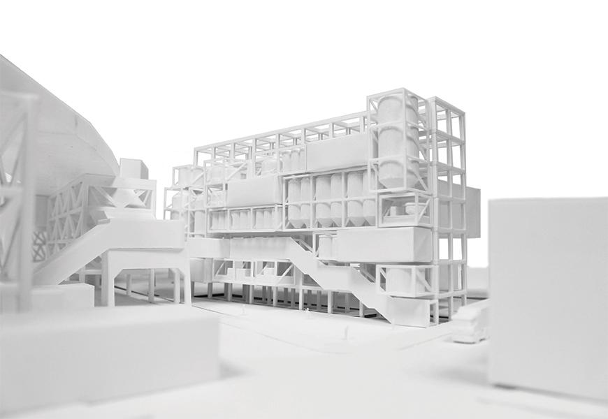 Architectural model of project in the site painted in white. 