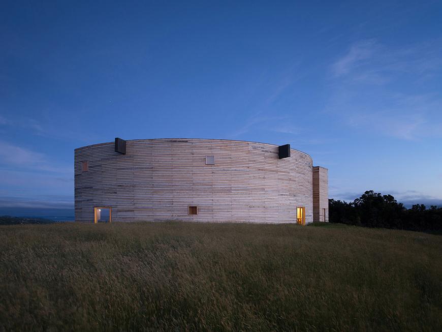 a round building in a field