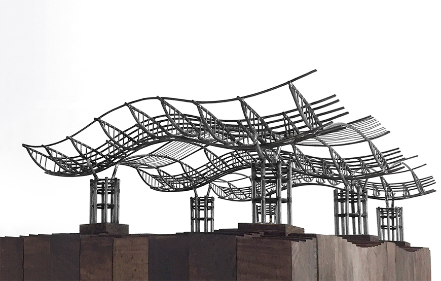 A structural model consisting of a series of curved, interconnected steel structures which are elevated from the ground. 