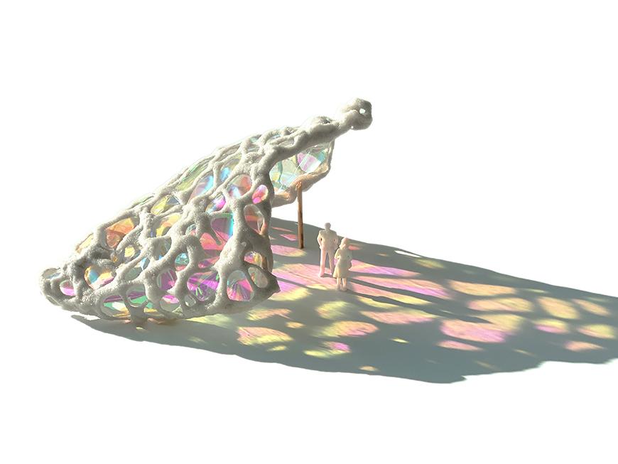 Study model of canopy with colored film emitting shadow.