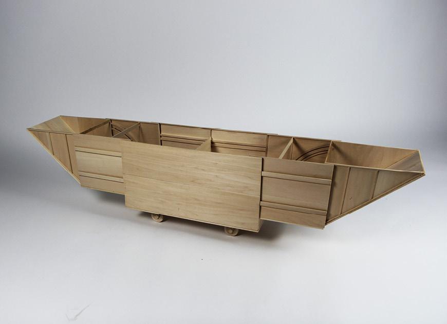 Wood boat-shaped model.