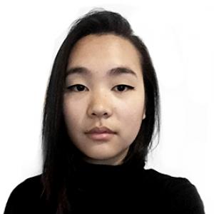 headshot of a young woman with dark hair wearing a black sweater