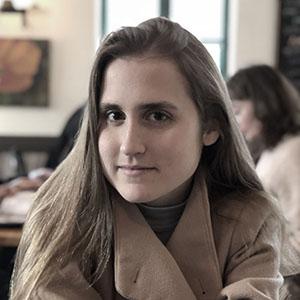 A woman with long brown hair. 